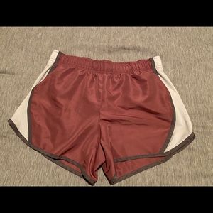 Pink and white athletic shorts